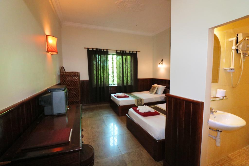 Firefly Guesthouse - The Berlin Angkor Siem Reap Pokoj fotografie